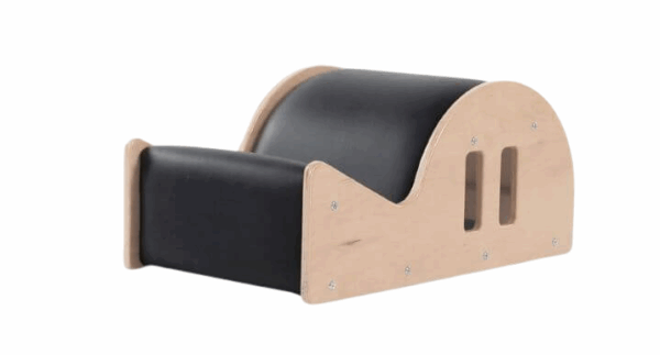 Clara Step Barrel with black upholstery and wooden frame.