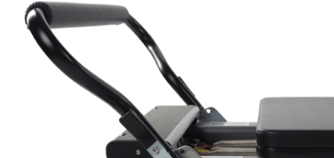 Adjustable Pilates Footbar with two-way adjustments for safety.