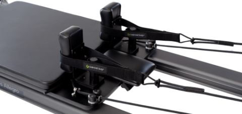 Balanced Body Pilates reformer with adjustable TwistLock shoulder rests.