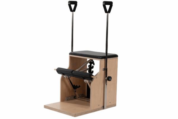 Balanced Body Combo Chair with ergonomic handles and dual pedal.
